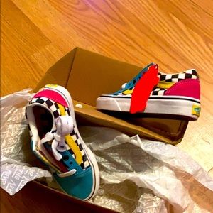 A pair of girl Vans and girl AirMax